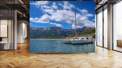 Catamaran sailing in the sea. Cruise on a catamaran at summer Wall mural