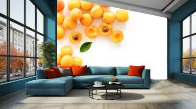 Fruit frame. Apricots and leaves on white background top view copy space Wall mural