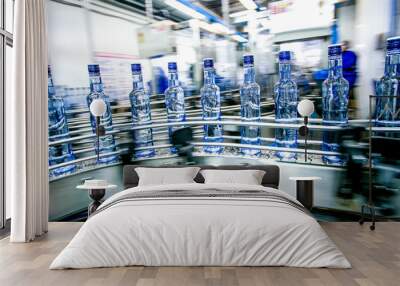 Many bottles on conveyor belt Wall mural