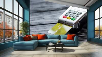 purchasing concept with card payment and terminal on table backg Wall mural