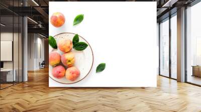 Summer fruits. Ripe red peaches on plate on white table top-down copy space Wall mural