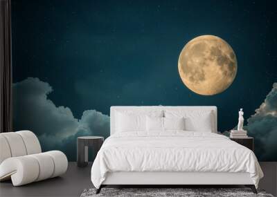 A beautiful full moon shines brightly in a starry night sky, partially hidden by fluffy clouds, creating a serene and mystical atmosphere. Wall mural