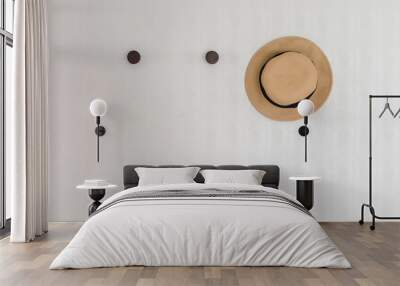 brown hat hanging on wall hook Wall mural