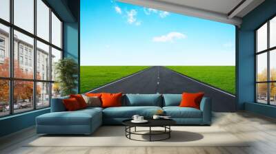 Asphalt road with blue sky Wall mural