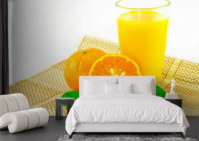 Orange fruit slice and juice on white background Wall mural