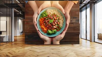 Nutritious and Colorful Meal Shared Among Hands A Symbol of Togetherness and Healthy Eating Wall mural