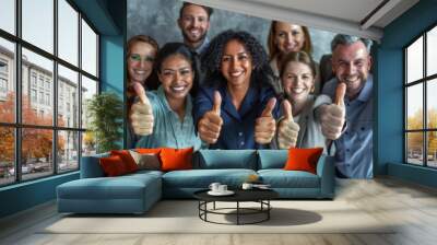 Thumbs up from a happy business team excited about the success they achieve together at work. Overhead view diverse group of corporate people excited by success and give approval to winning Wall mural