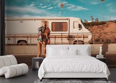 retro style skater girl with a camper van in the background. california lifestyle Wall mural