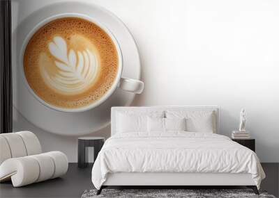 A cappuccino coffee cup on a white background seen from above and bathed in soft light Wall mural