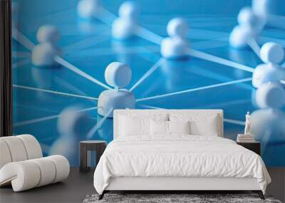 A group of small white figurines are positioned on a blue surface, symbolizing connected networking. The scene represents communication and marketing strategies in a simplistic visual form. Wall mural