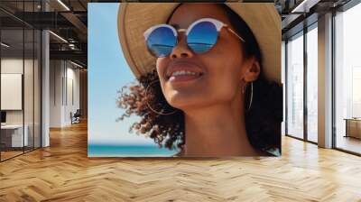 Biracial woman in casual summer outfit enjoys a sunny beach day without any modifications Ideal attire for a laid back day by the ocean Wall mural