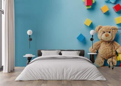 Children s Toy Banner with Teddy Bear and Colorful Blocks on Light Blue Background Wall mural