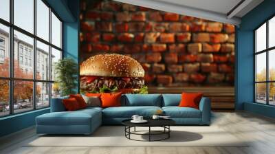 Classic hamburger on wooden table in front of brick wall with space for text Wall mural