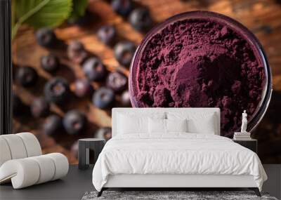 Dried acai berry powder superfood presented in a mason jar on a wooden surface Wall mural