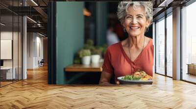 Elderly woman enjoying vegan meal at home caring for her body With copyspace for text Wall mural