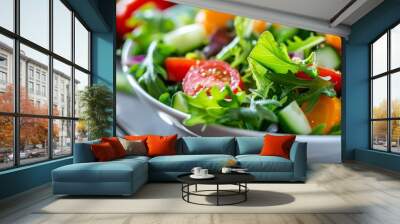 Fresh and vibrant salad bowl with juicy tomatoes and assorted colorful vegetables for a healthy meal Wall mural