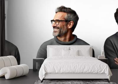 handsome middle aged man in casual attire and glasses observing to the side with a relaxed and confi Wall mural