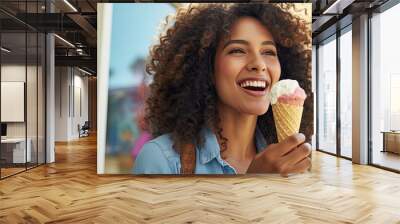 Happy Latin woman enjoying an ice cream cone after buying frozen yogurt at the shop. Wall mural