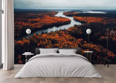 In the autumn, the lakes and rivers in Finland get filled with water from heavy rains. The colours of the forests start to reflect in these dark waters, making the entire landscape look amazing. Wall mural