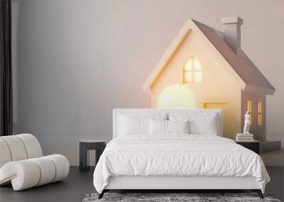 LED light bulb and tiny house on a white background Wall mural