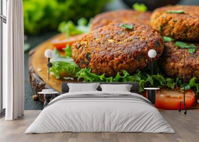 Plant-based falafel patty on a wooden platter with veggies. Wall mural