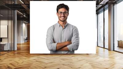 smiling young man in casual attire and glasses arms crossed looking at the camera happily Wall mural