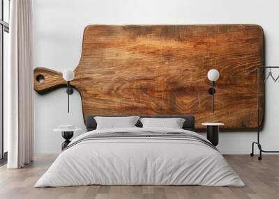 Top view of a single wooden cutting board on a white surface Wall mural