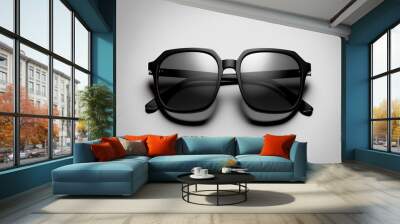 Top view of stylish sunglasses with a black plastic frame on a white backdrop. Generative AI Wall mural