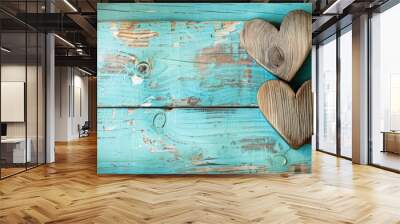 Two charming wooden hearts delicately arranged on a lovely turquoise backdrop of aged wood setting the perfect mood for Valentine s Day Wall mural