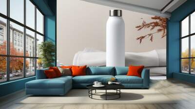 white water bottle beside cup and mug Wall mural