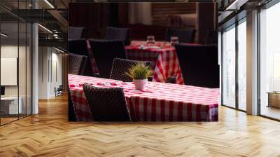 Lonely tables of street cafe at night, Strasbourg Wall mural