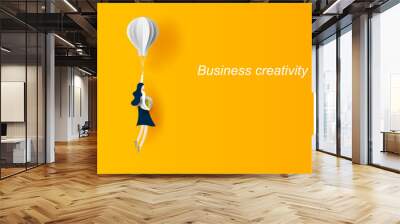 Business concept idea.Woman flying with balloon Hold dollar coin. Symbol of innovation.Start up for success.Girl discover best ideas Graphic design paper cut and art style for card Vector illustration Wall mural