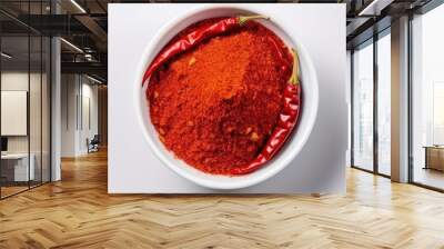 Top View of Red chilly powder in white bowl with red chilly isolated on white background. Wall mural