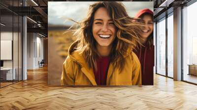 Friends laughing together on a road trip bold color palette Wall mural