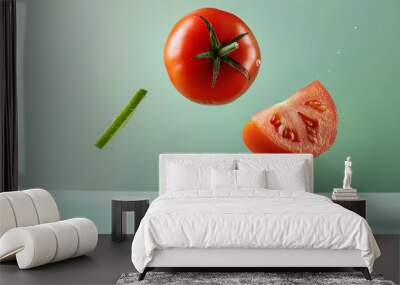 cherry tomato slice levitating on green background Wall mural