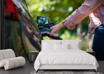 Power supply for hybrid electric car charging battery,sustainable and economic transportation concept Wall mural