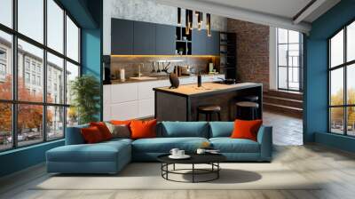 luxury studio apartment with a free layout in a loft style in dark colors. Stylish modern kitchen area with an island, cozy bedroom area with fireplace and personal gym Wall mural