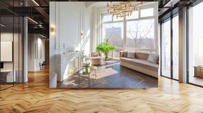 very light and bright interior of luxurious cozy living room with chic soft beige furniture with gold metallic elements, huge window to the floor and wooden parquet Wall mural