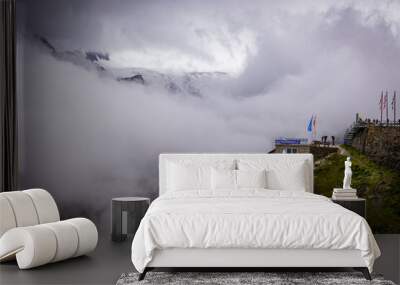 Deep clouds over Grossglockner High Alpine Road in Austria - travel photography Wall mural