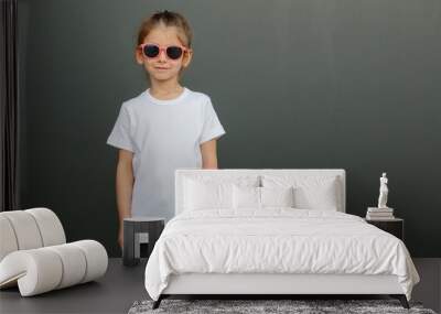 Girl kid wearing white blank  t-shirt with space for your logo or design in casual urban style Wall mural