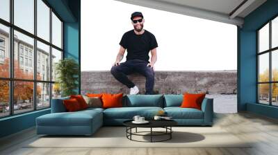 Hipster handsome male model with beard wearing black blank t-shirt with space for your logo or design in casual urban style Wall mural