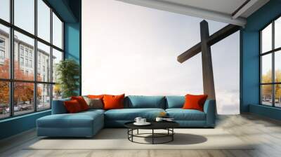 Wooden cross over sunrise background Wall mural