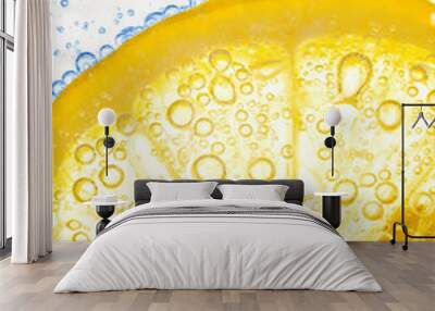 close-up of lemon slice in clear water with bubbles Wall mural