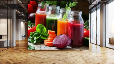 four kind of vegetable juices: red, burgundy, orange, green, in Wall mural