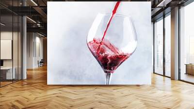 French dry red wine, pours into glass, gray background, banner, selective focus Wall mural