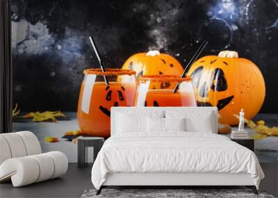 halloween composition with festive red bloody drink and smiling pumpkins, with sweet corn and fallen Wall mural