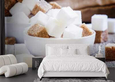 Pieces of white and brown sugar, selective focus Wall mural