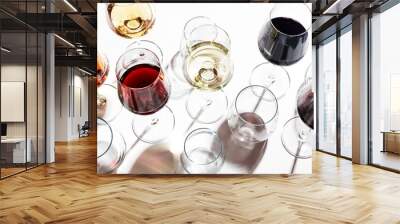 Red, white, rose wines in glasses in assortment on white background, top view. Wine bar, shop, winery, outdoor wine tasting concept. Hard light and harsh shadows Wall mural