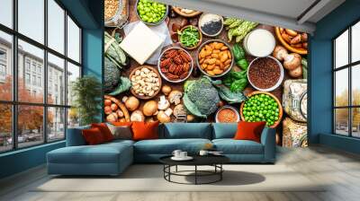 Vegan protein food background. Full set of plant based vegetarian food sources. Healthy eating, diet ingredients: legumes, beans, nuts, soy and almond milk, tofu, quinoa, vegetables, seeds and sprouts Wall mural