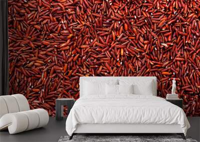 Wild raw red rice groats, food background texture, top view Wall mural